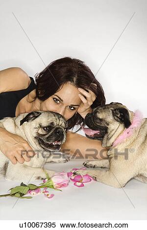 Caucasian prime adult female with two Pug dogs. View Large Photo Image Stock Photography - Caucasian prime adult female with two Pug dogs.. Fotosearch