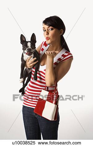 Young adult female Caucasian holding Boston Terrier. View Large Photo Image Stock Photography - Young adult female Caucasian holding Boston Terrier.. Fotosearch