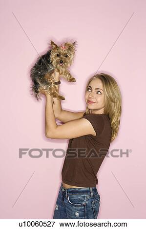 Caucasian young adult female with Yorkshire Terrier dog. View Large Photo Image Stock Photo - Caucasian young adult female with Yorkshire Terrier dog.. Fotosearch