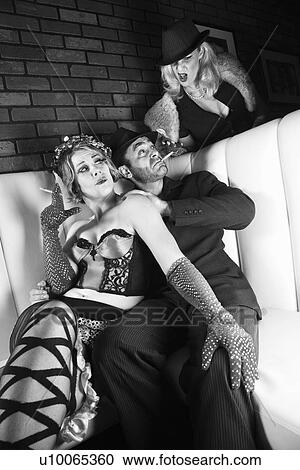 Caucasian prime adult male torn between two Caucasian prime adult females. View Large Photo Image Stock Image - Caucasian prime adult male torn between two Caucasian prime adult females.. Fotosearch
