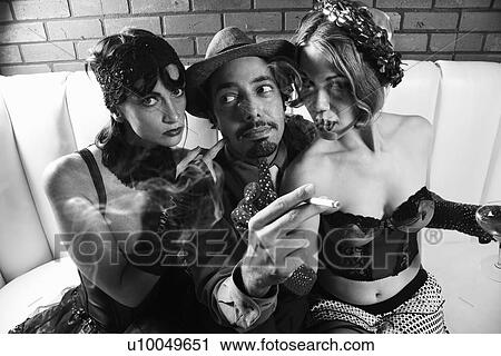 Caucasian prime adult retro male sitting between two Caucasian prime adult retro females. View Large Photo Image Stock Image - Caucasian prime adult retro male sitting between two Caucasian prime adult retro females.. Fotosearch