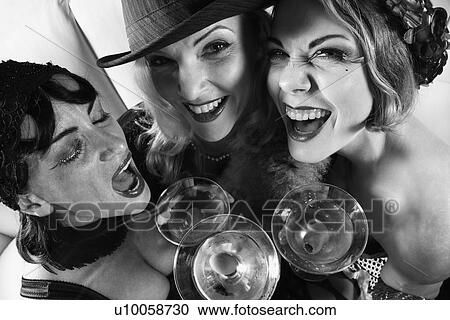 Stock Image - Three retro prime adult Caucasian females out on the town.. Fotosearch
