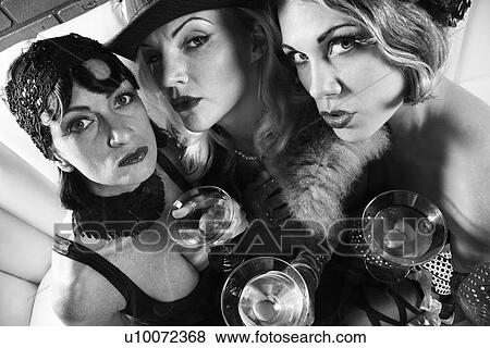 Stock Photo - Three retro prime adult Caucasian females out on the town.. Fotosearch