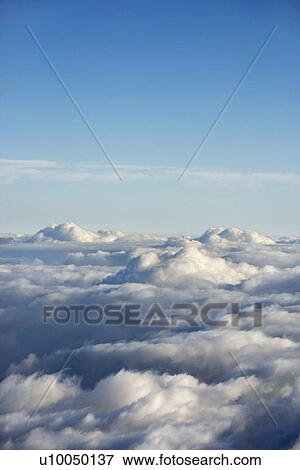 Aerial shot of clouds in Haleakala National Park, Maui, Hawaii. View Large Photo Image Stock Photo - Aerial shot of clouds in Haleakala National Park, Maui, Hawaii.. Fotosearch