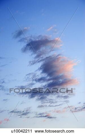 Blue sky and clouds at dusk over Maui, Hawaii, USA. View Large Photo Image Stock Image - Blue sky and clouds at dusk over Maui, Hawaii, USA.. Fotosearch