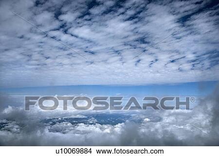 Blue sky and clouds over Maui, Hawaii, USA. View Large Photo Image Picture - Blue sky and clouds over Maui, Hawaii, USA.. Fotosearch