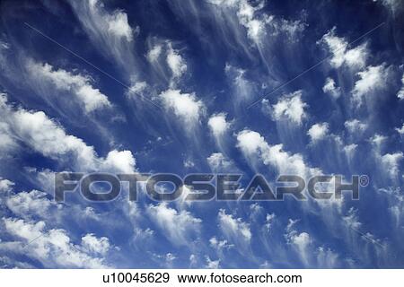 Stock Photo - Blue sky and clouds over Maui, Hawaii, USA.. Fotosearch