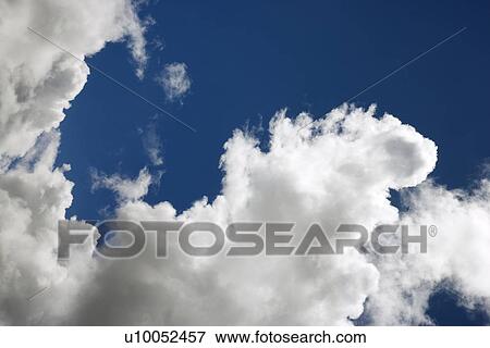 Stock Photo - Blue sky and clouds over Maui, Hawaii, USA.. Fotosearch