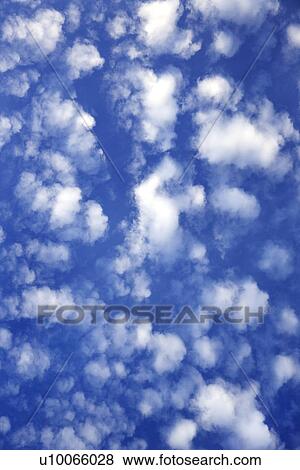 Blue sky with clouds. View Large Photo Image Stock Photo - Blue sky with clouds.. Fotosearch