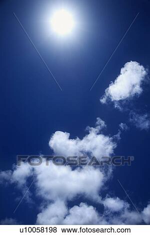 Cloud formation against blue sky. View Large Photo Image Stock Photo - Cloud formation against blue sky.. Fotosearch