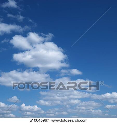 Stock Photo - Clouds in blue sky.. Fotosearch