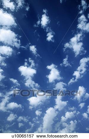 Cumulus clouds in blue sky. View Large Photo Image Stock Photo - Cumulus clouds in blue sky.. Fotosearch