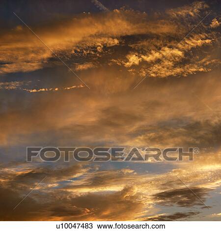 Golden clouds in sky with sunset. View Large Photo Image Stock Image - Golden clouds in sky with sunset.. Fotosearch