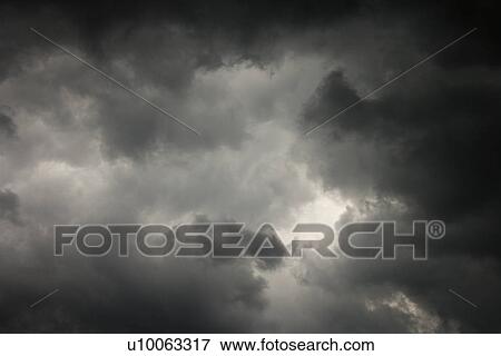 Stock Photo - Ominous abstract storm clouds.. Fotosearch