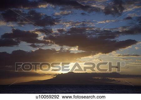 Sunset clouds over the coast of Kihei, Maui, Hawaii, USA. View Large Photo Image Stock Image - Sunset clouds over the coast of Kihei, Maui, Hawaii, USA.. Fotosearch