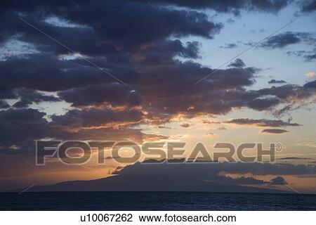 Sunset clouds over the coast of Kihei, Maui, Hawaii, USA. View Large Photo Image Stock Image - Sunset clouds over the coast of Kihei, Maui, Hawaii, USA.. Fotosearch