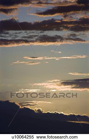 Sunset with clouds in Maui, Hawaii, USA. View Large Photo Image Stock Photography - Sunset with clouds in Maui, Hawaii, USA.. Fotosearch