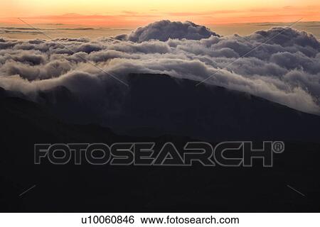 Stock Photograph - Aerial of sunrise in Haleakala National Park, Maui, Hawaii.. Fotosearch