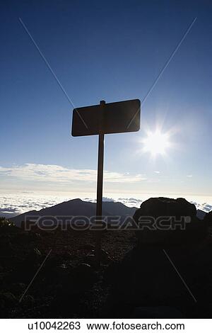 Silhouetted sign in Haleakala National Park in Maui, Hawaii. View Large Photo Image Stock Image - Silhouetted sign in Haleakala National Park in Maui, Hawaii.. Fotosearch