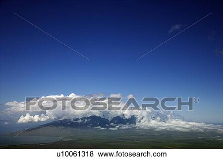 View of West Maui from Haleakala in Hawaii. View Large Photo Image Stock Photo - View of West Maui from Haleakala in Hawaii.. Fotosearch