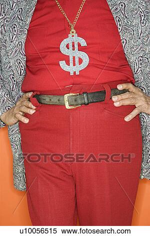 Mature adult Caucasian male wearing money sign necklace. View Large Photo Image Stock Photography - Mature adult Caucasian male wearing money sign necklace.. Fotosearch