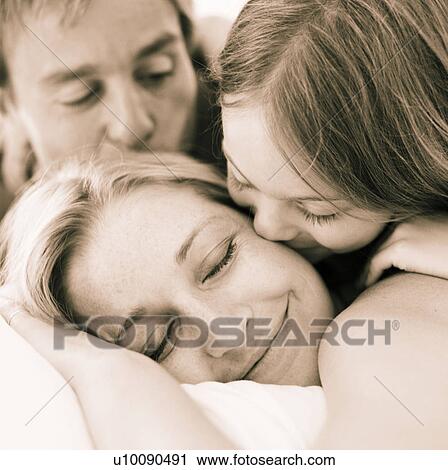 Stock Image - Family at home. Fotosearch