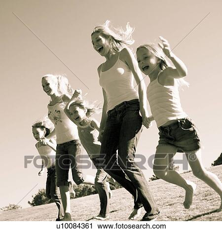 Stock Image - Family in Park. Fotosearch