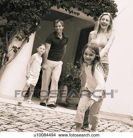 Family leaving house View Large Photo Image Picture - Family leaving house. Fotosearch