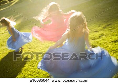 Picture - Three girls in park. Fotosearch