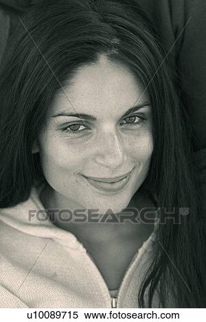 Woman smiling at camera View Large Photo Image Stock Photography - Woman smiling at camera. Fotosearch