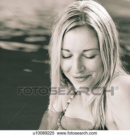 Young woman in swimming pool View Large Photo Image Stock Photography - Young woman in swimming pool. Fotosearch