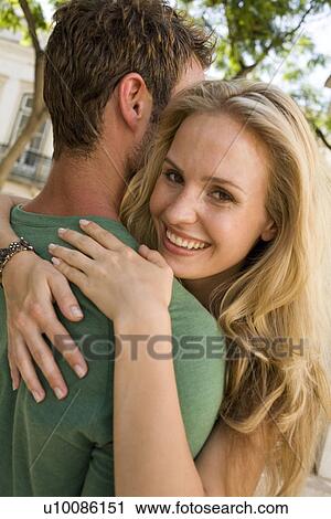 Stock Image - Couple in town. Fotosearch