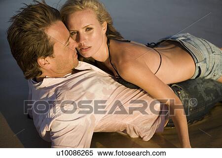 Couple on beach View Large Photo Image Stock Photography - Couple on beach. Fotosearch