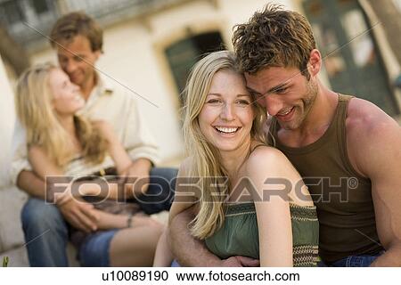 Stock Image - Two couples. Fotosearch