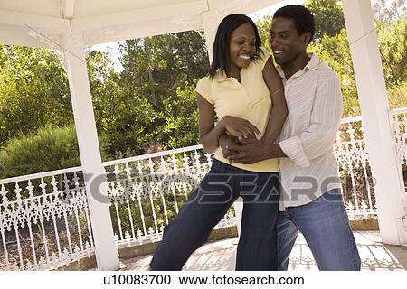 Stock Image - Young couple dancing. Fotosearch