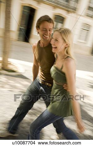 Couple in town View Large Photo Image Picture - Couple in town. Fotosearch