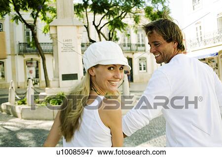 Couple in town View Large Photo Image Stock Photo - Couple in town. Fotosearch
