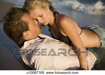 Couple on beach View Large Photo Image Stock Photo - Couple on beach. Fotosearch