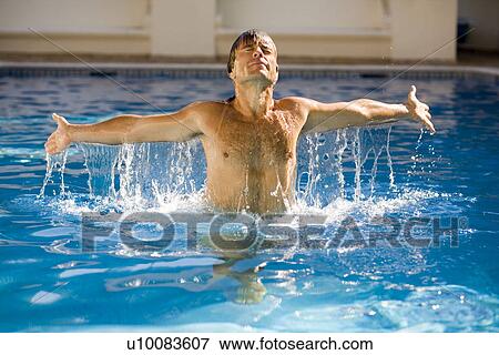 Man in pool View Large Photo Image Stock Photo - Man in pool. Fotosearch