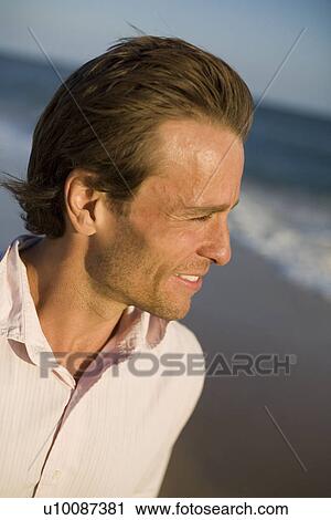 Man on beach View Large Photo Image Stock Image - Man on beach. Fotosearch