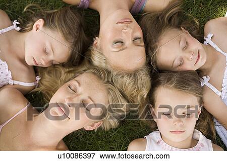 Stock Photo - Two adults and three children. Fotosearch