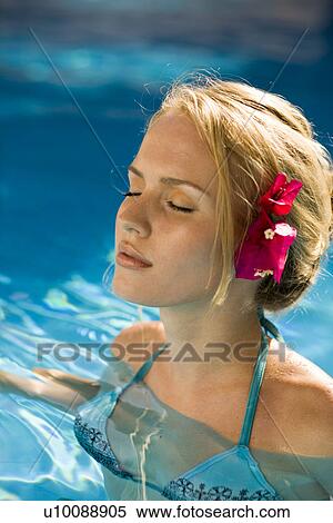 Stock Photography - Woman in pool. Fotosearch