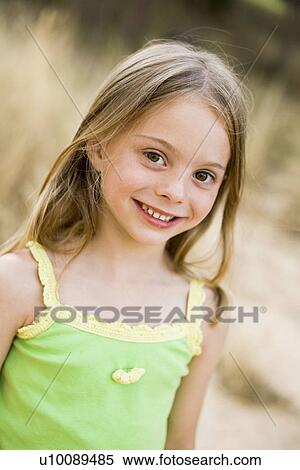 Young girl in park View Large Photo Image Stock Photography - Young girl in park. Fotosearch