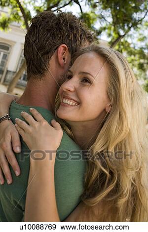 Stock Photo - Couple in town. Fotosearch