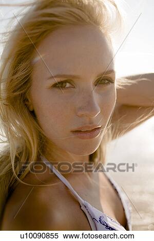 Stock Photography - One women on beach. Fotosearch