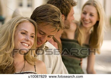 Stock Photo - Two couples. Fotosearch