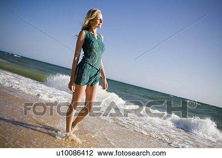 Woman on beach View Large Photo Image Stock Image - Woman on beach. Fotosearch