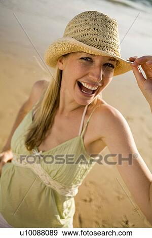 Stock Photo - Woman on beach. Fotosearch