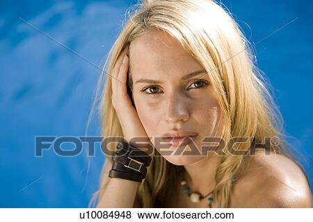 Young woman in swimming pool View Large Photo Image Stock Photo - Young woman in swimming pool. Fotosearch
