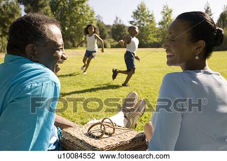 Family and grandparents in park View Large Photo Image Stock Image - Family and grandparents in park. Fotosearch